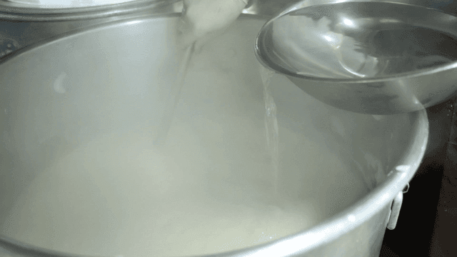 Salt water poured into boiling bean water