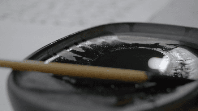 Inkstone with brush for calligraphy