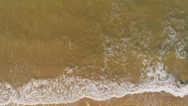 White Sand Beach with Wrinkled Waves