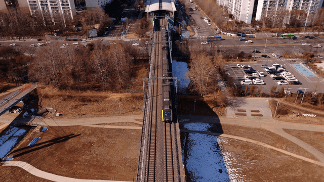 Train passing through urban area