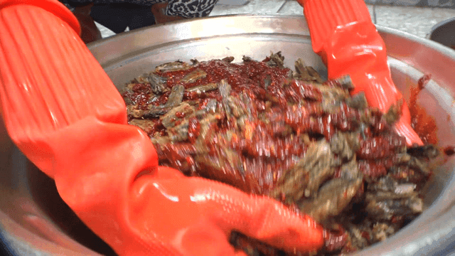 Dried fish Mixed with Seasoning in Large Bowl