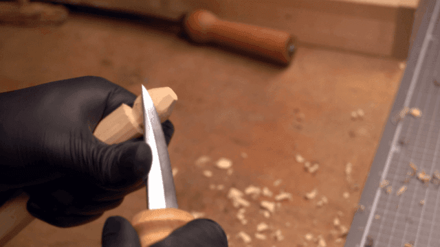 Wood carving with precision in a workshop