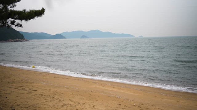 Calm Beach on a Cloudy Day