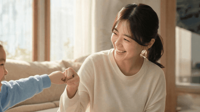 Sweet moment between mother and daughter in living room