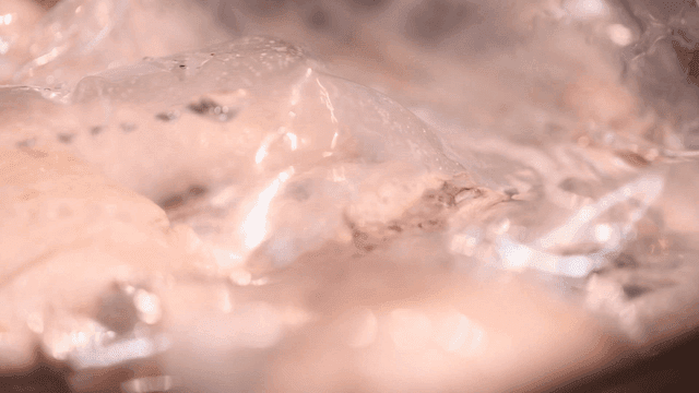 Sous vide chicken wrapped in plastic