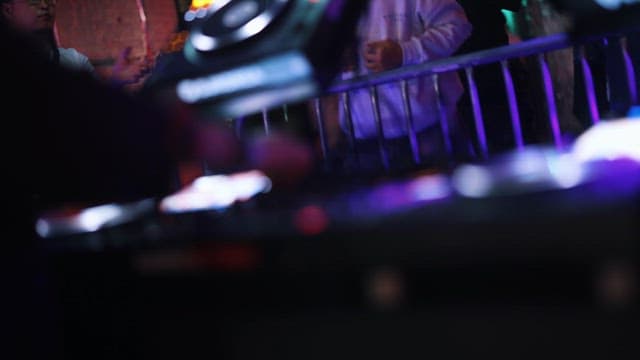 Side View of a DJ Performing