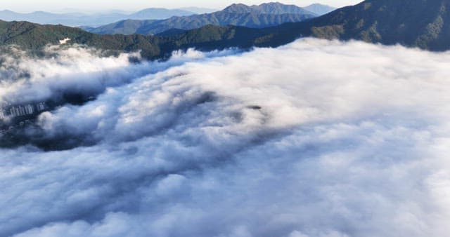 Mountains covered in clouds