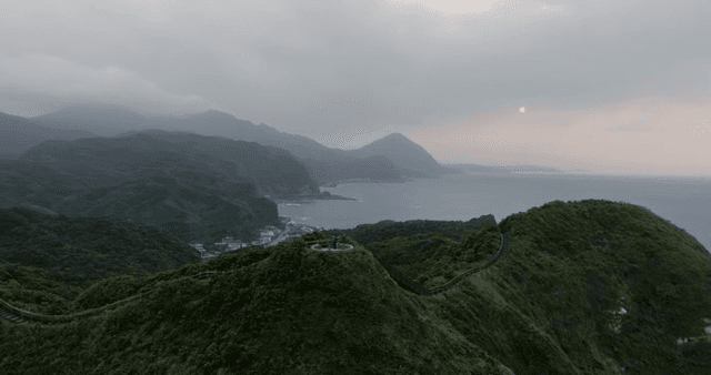 Scenic mountain view with ocean