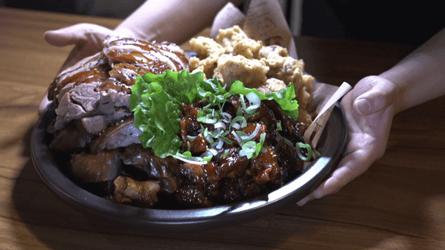 Generous portion of pig's trotters served with vegetables