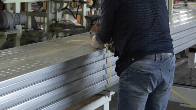 Worker operating machinery in a factory