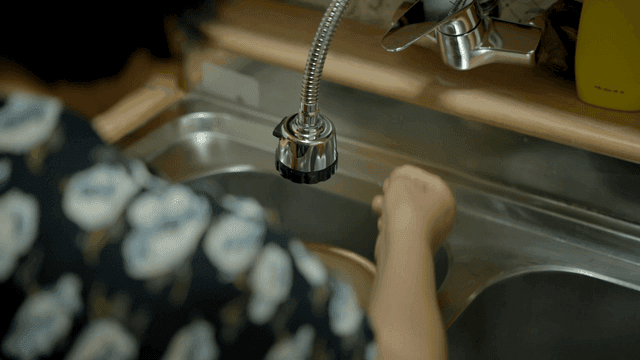 Filling a pot with water at the sink