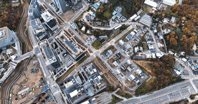 Aerial view of a city with skyscrapers and roads