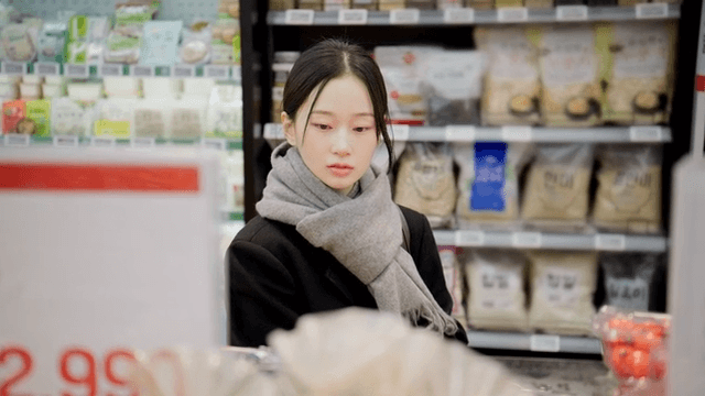 Young woman shopping at supermarket
