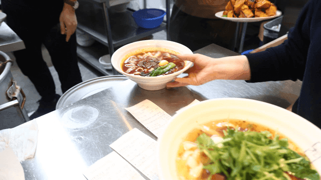 Hand-cut noodles served in spicy broth