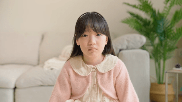 Young girl sighing