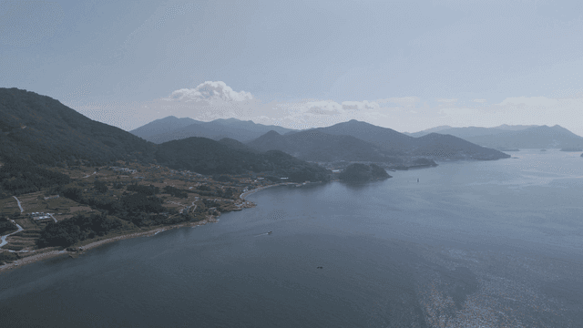 Coastal scenery with mountains.
