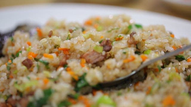 Spoonful of colorful fried rice