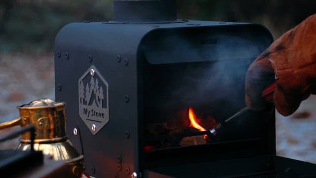 Lighting the Stove with a Torch