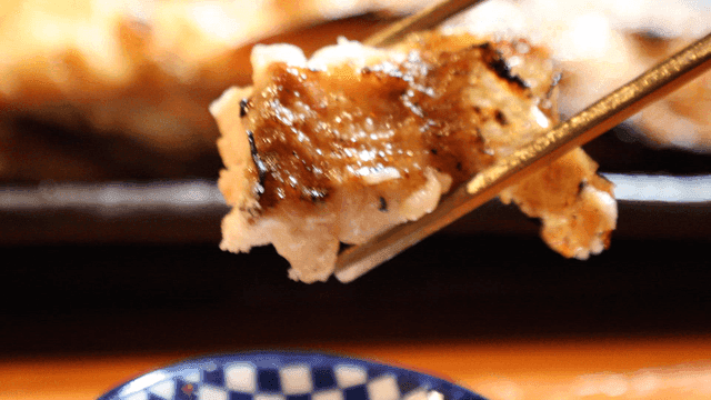 Grilled fish dipped in salt