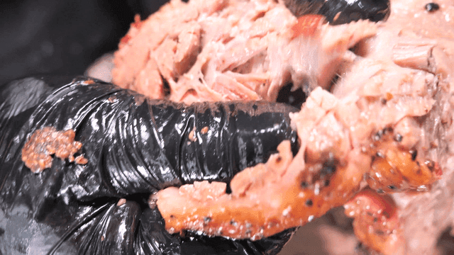 Tender brisket barbecue that tears apart with gloved hands