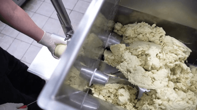 Dough being mixed in an industrial mixer