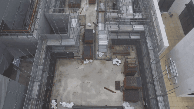 Construction site with scaffolding and materials