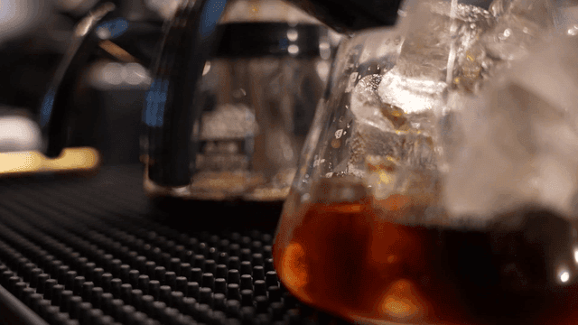 Coffee dripping into glass teapot
