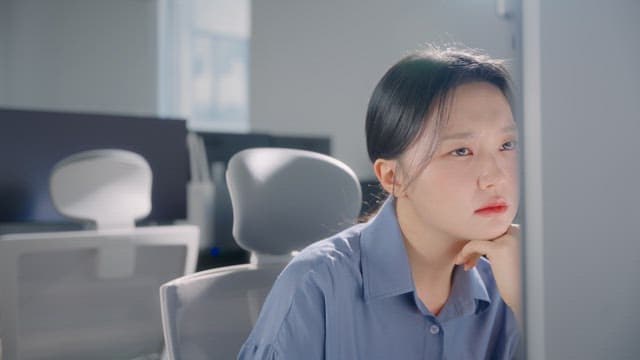 Woman working at an office desk