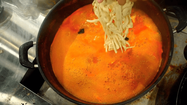 Noodles in red broth