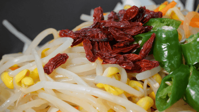Fresh bean sprouts with dried goji berries and seasoning