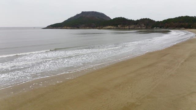 Tranquil beach with gentle waves