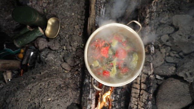 Crab dish cooked over a blazing charcoal fire