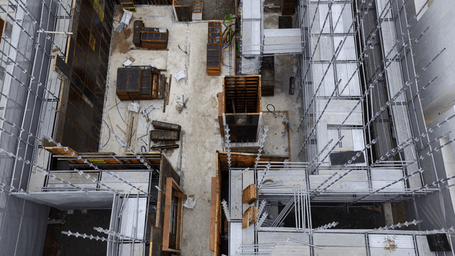 Construction site with scaffolding and materials