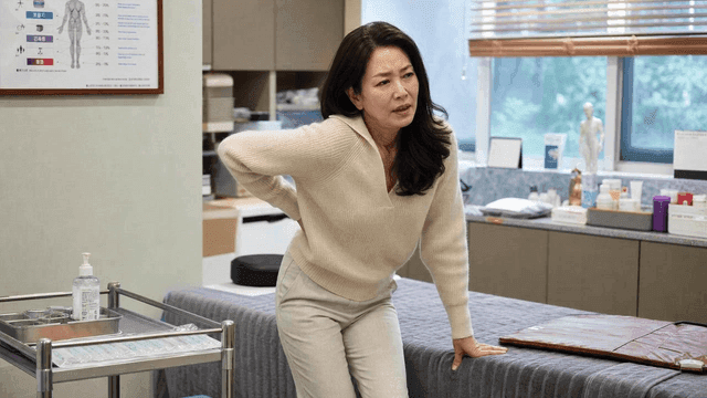 Women suffering from back pain at clinic
