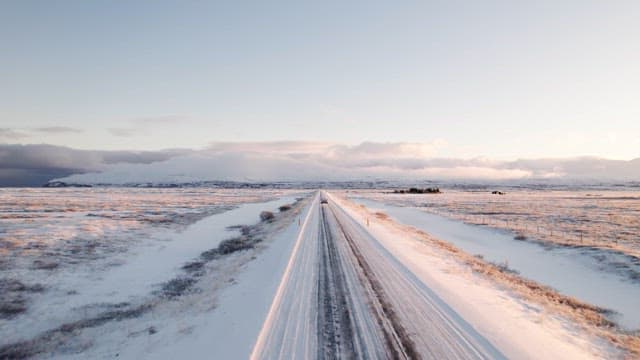 Car driving on a snowy road