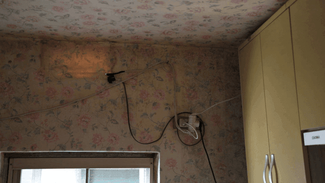 Floral wallpaper and drawer