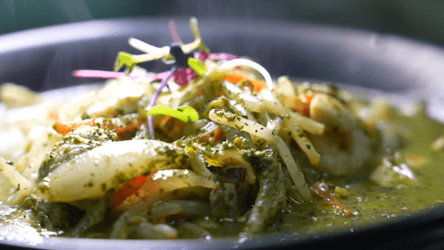 Steaming vegetable jjamppong dish with herbs