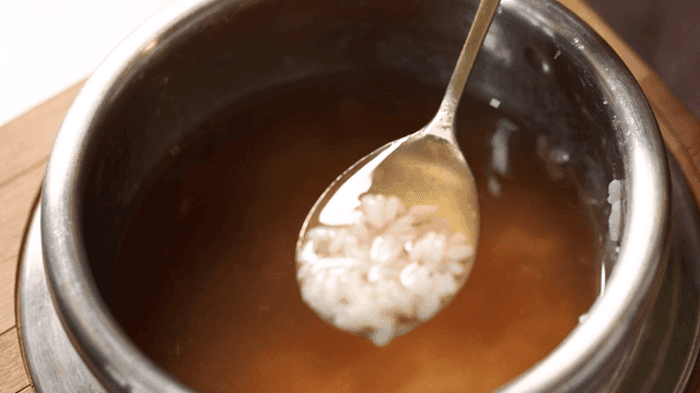 Spoonful of sungnyung mixed with water