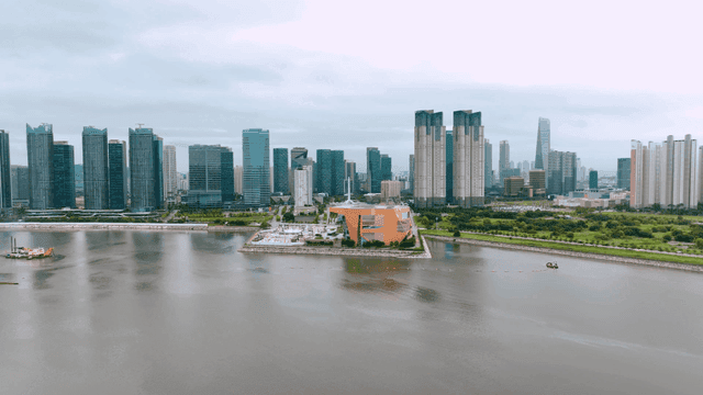 Modern city skyline with river view