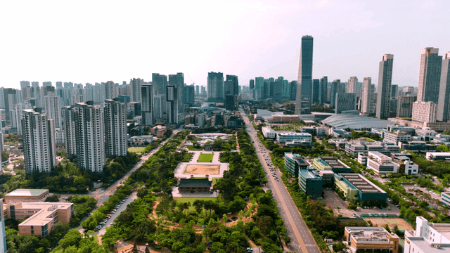 Modern city view with high-rise buildings and greenery
