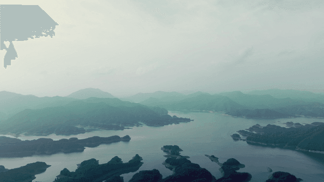 Tranquil lake surrounded by mountains