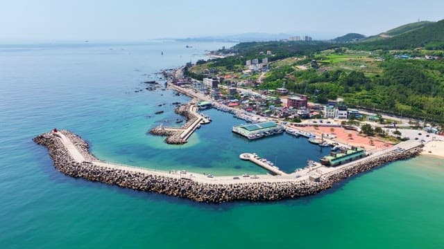 Coastal village with breakwaters