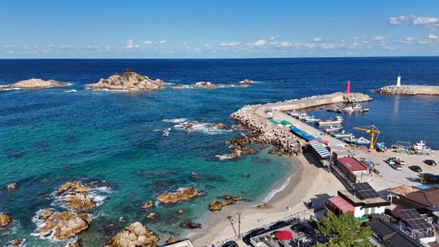 Coastal harbor with clear blue waters