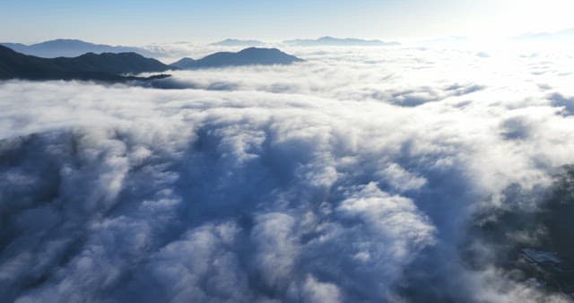 Clouds over mountain peaks