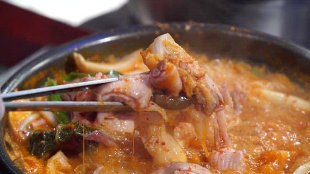 Spicy chicken hotpot boiling in a pot