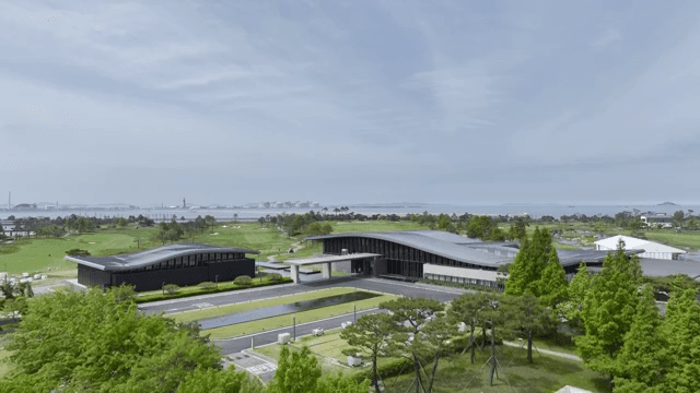 Modern golf course with clubhouse and greenery