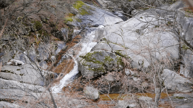 A small waterfall flowing over rocks