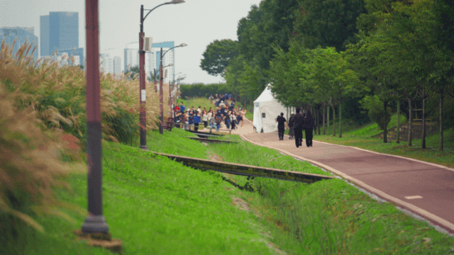 People walking in an autumn park in Seoul city