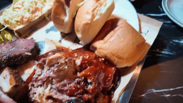 Pulled pork sandwich in morning roll