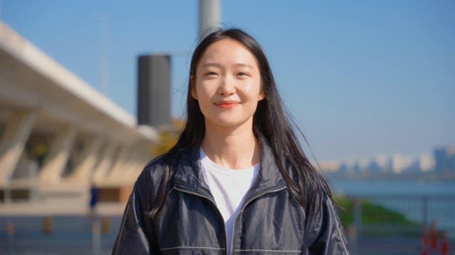 Woman jogging with a smile